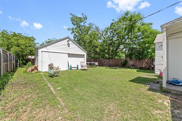 2612 1st St, Brownwood, TX 76801 - view of yard with an outbuilding and a garage