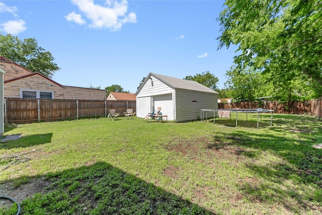 2612 1st St, Brownwood, TX 76801 - view of yard with a trampoline, a storage unit, and an outdoor structure