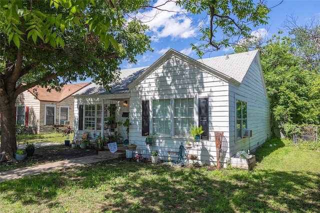 2612 1st St, Brownwood, TX 76801 - view of front of property with a shingled roof and cooling unit