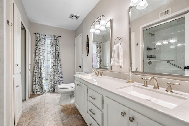 4145 Malone Ave, The Colony, TX 75056 - bathroom with visible vents, a sink, and a shower