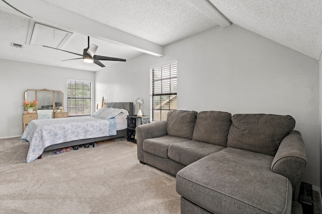 4145 Malone Ave, The Colony, TX 75056 - carpeted bedroom featuring multiple windows, beamed ceiling, a ceiling fan, and a textured ceiling