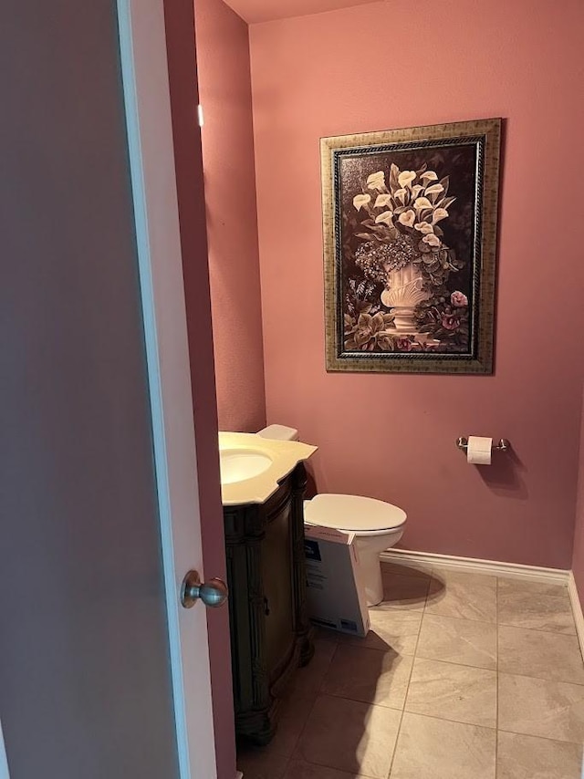1824 Shady Point Circle Dr, San Angelo, TX 76904 - bathroom featuring toilet, baseboards, and vanity