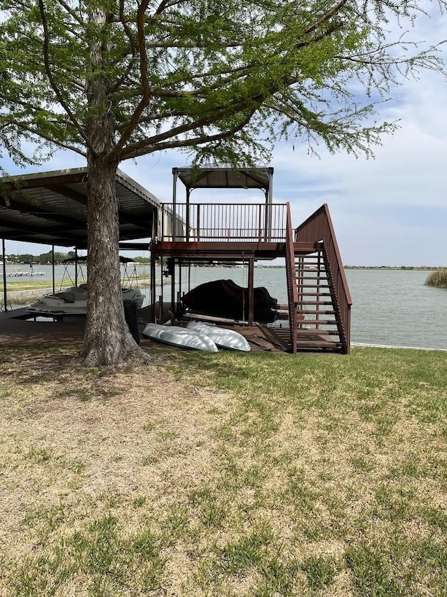 1824 Shady Point Circle Dr, San Angelo, TX 76904 - wooden terrace featuring a lawn, a water view, and stairway