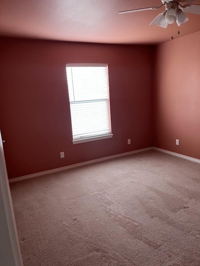 1824 Shady Point Circle Dr, San Angelo, TX 76904 - unfurnished room featuring baseboards, a ceiling fan, and carpet floors