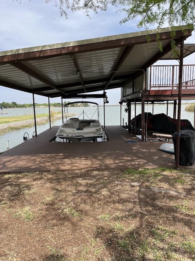 1824 Shady Point Circle Dr, San Angelo, TX 76904 - view of vehicle parking featuring a water view, boat lift, and a dock