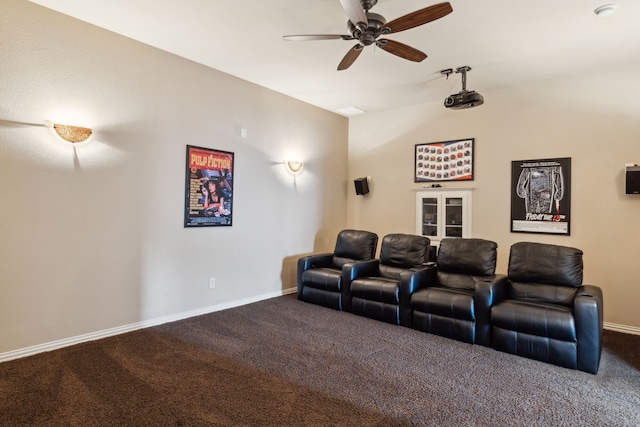 1306 Andrew Ct, Lewisville, TX 75056 - home theater featuring dark colored carpet, ceiling fan, and baseboards