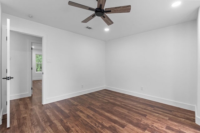 6725 Macintosh Dr, Plano, TX 75023 - spare room with dark wood-style flooring, a ceiling fan, recessed lighting, and baseboards