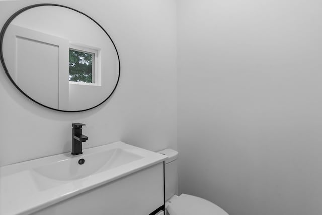 6725 Macintosh Dr, Plano, TX 75023 - bathroom featuring toilet and vanity
