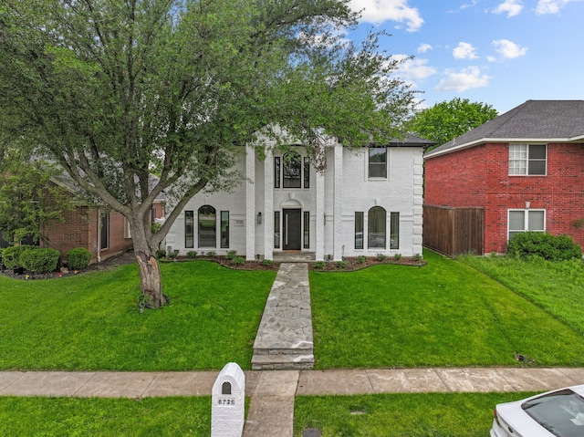 6725 Macintosh Dr, Plano, TX 75023 - greek revival house with fence and a front yard