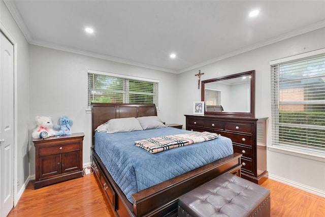 bedroom featuring recessed lighting, baseboards, ornamental molding, and light wood-type flooring