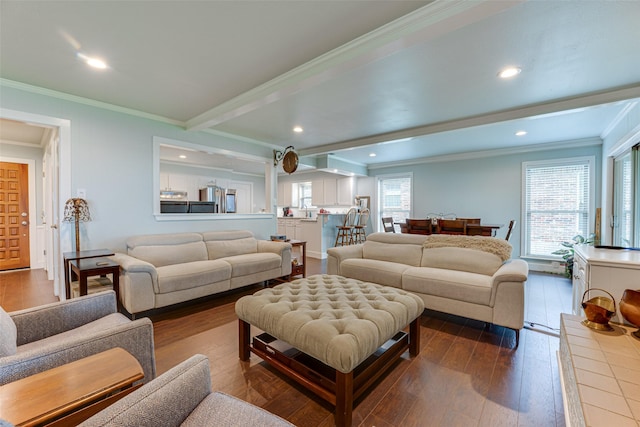 living room with recessed lighting, ornamental molding, a wealth of natural light, and dark wood-type flooring