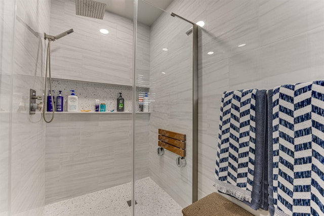 bathroom featuring a shower stall