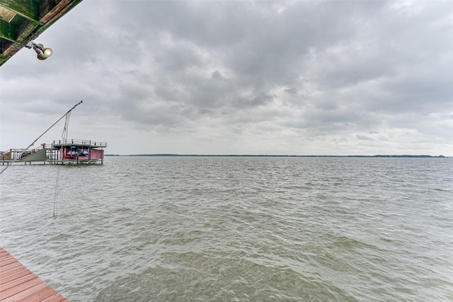dock area featuring a water view
