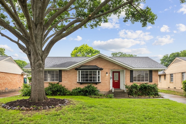 9661 Lynbrook Dr, Dallas, TX 75238 - ranch-style home with roof with shingles, a front lawn, and brick siding