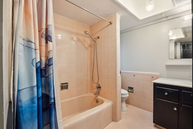 9661 Lynbrook Dr, Dallas, TX 75238 - full bathroom with vanity, tile patterned flooring, shower / bath combination with curtain, toilet, and tile walls