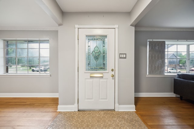 9661 Lynbrook Dr, Dallas, TX 75238 - foyer entrance featuring baseboards and wood finished floors