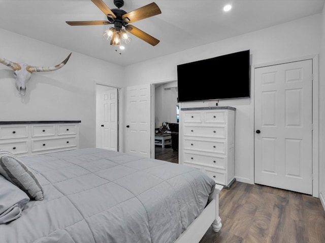 bedroom featuring recessed lighting, a ceiling fan, and dark wood-style floors