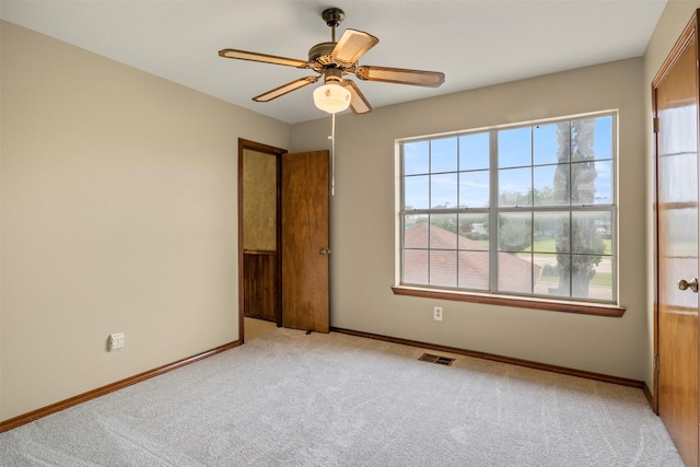 unfurnished bedroom with visible vents, baseboards, and carpet floors