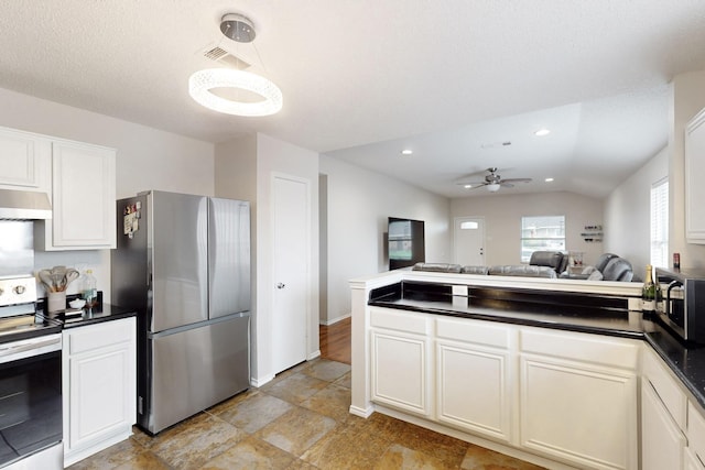 kitchen featuring a ceiling fan, visible vents, dark countertops, open floor plan, and stainless steel appliances