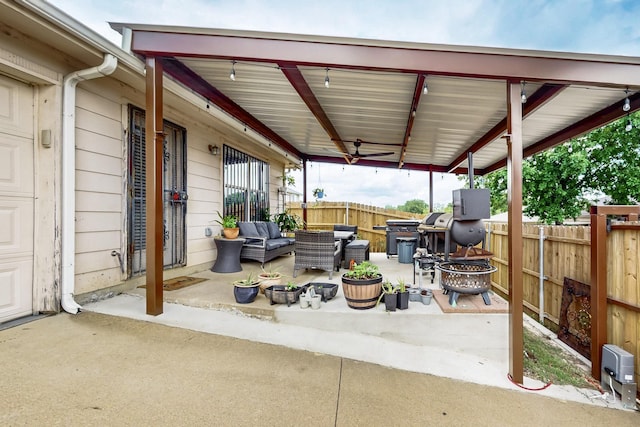 view of patio / terrace with fence and outdoor lounge area