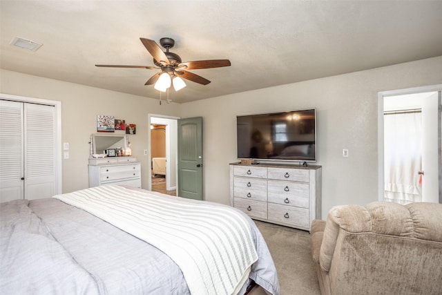 1076 N Cedar St, Muenster, TX 76252 - bedroom with a ceiling fan, visible vents, light carpet, and a closet
