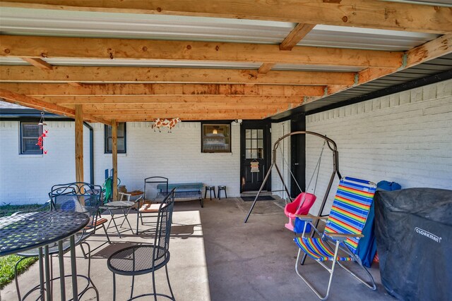 1076 N Cedar St, Muenster, TX 76252 - view of patio / terrace featuring outdoor dining space
