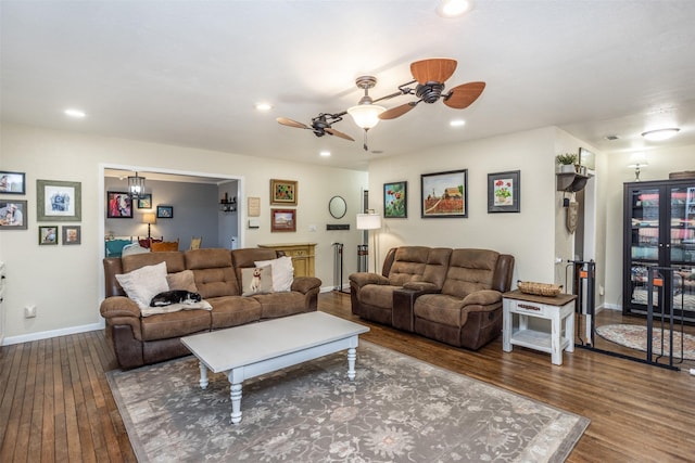 1076 N Cedar St, Muenster, TX 76252 - living area featuring wood-type flooring, recessed lighting, ceiling fan, and baseboards