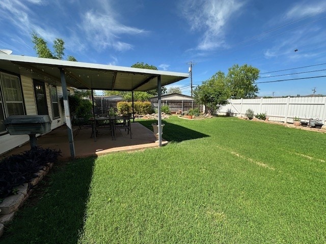 view of yard featuring a fenced backyard and a patio area
