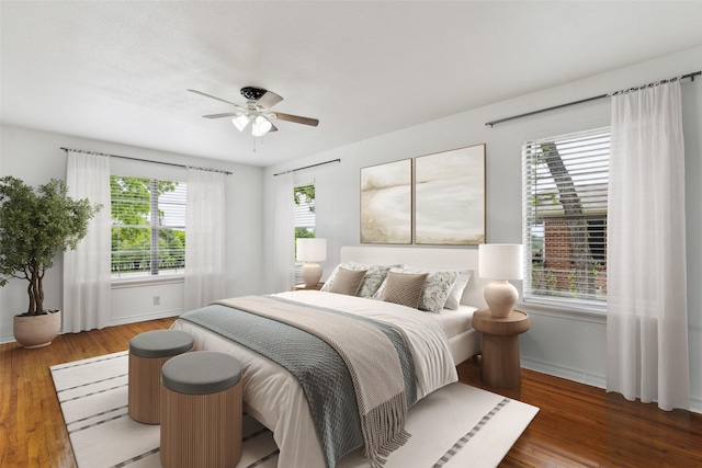 2136 Van Cleave Dr, Dallas, TX 75216 - bedroom with baseboards, ceiling fan, and wood finished floors