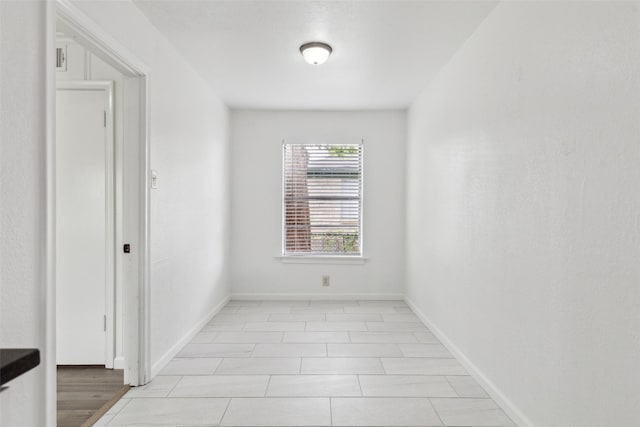 2136 Van Cleave Dr, Dallas, TX 75216 - spare room featuring baseboards