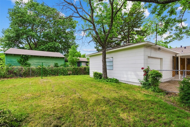 2136 Van Cleave Dr, Dallas, TX 75216 - view of yard featuring an attached garage and fence