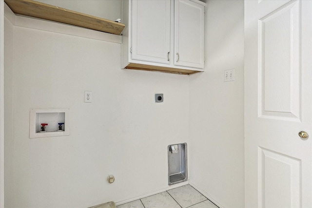 clothes washing area with light tile patterned floors, washer hookup, hookup for an electric dryer, and cabinet space