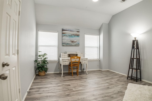 10228 Crawford Farms Dr, Fort Worth, TX 76244 - home office featuring plenty of natural light, wood finished floors, vaulted ceiling, and baseboards