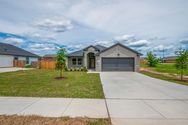 3510 Middlefield Rd, Dallas, TX 75253 - french country style house with brick siding, concrete driveway, and a garage