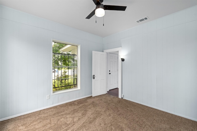 2124 21st St, Fort Worth, TX 76164 - unfurnished room with carpet floors and a ceiling fan