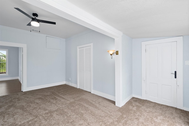2124 21st St, Fort Worth, TX 76164 - empty room with carpet flooring, baseboards, and a ceiling fan