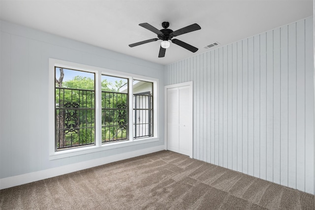 2124 21st St, Fort Worth, TX 76164 - empty room featuring carpet floors and a ceiling fan