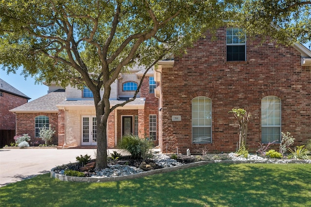 708 Renaissance Ct, Keller, TX 76248 - traditional-style home featuring a front lawn, french doors, and brick siding