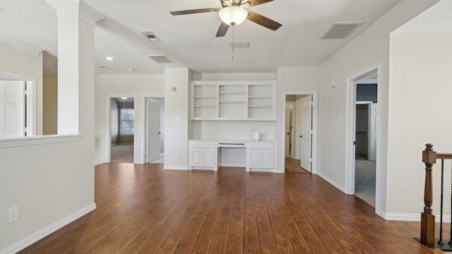 708 Renaissance Ct, Keller, TX 76248 - unfurnished living room featuring built in desk, visible vents, ceiling fan, and dark wood-type flooring