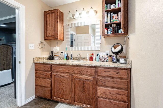 3756 County Road 192, Anson, TX 79501 - bathroom with vanity and baseboards