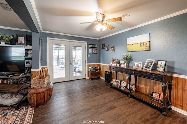 3756 County Road 192, Anson, TX 79501 - entrance foyer featuring french doors, ceiling fan, wood finished floors, and a wainscoted wall