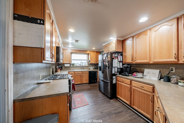 3756 County Road 192, Anson, TX 79501 - kitchen with backsplash, appliances with stainless steel finishes, dark wood finished floors, a sink, and recessed lighting