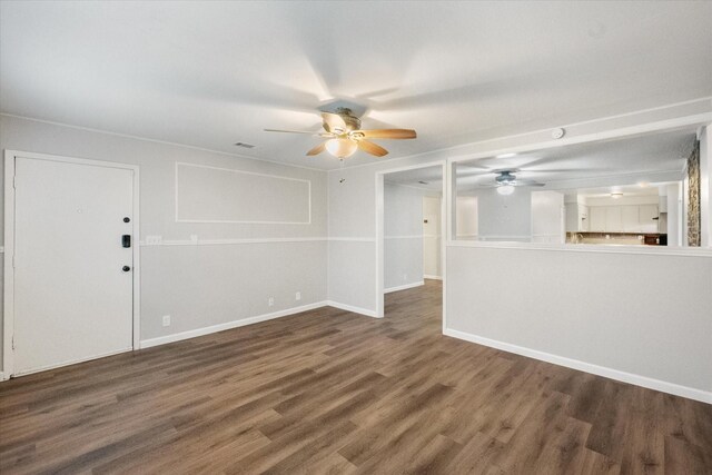 806 Marigold Dr, Cedar Hill, TX 75104 - unfurnished living room featuring a ceiling fan, baseboards, visible vents, and wood finished floors