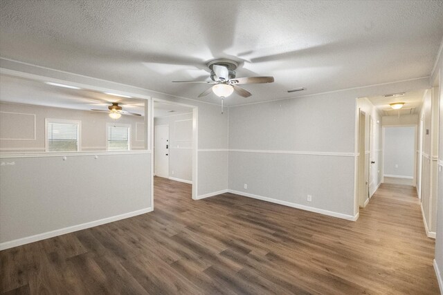 806 Marigold Dr, Cedar Hill, TX 75104 - empty room featuring a textured ceiling, ceiling fan, and wood finished floors