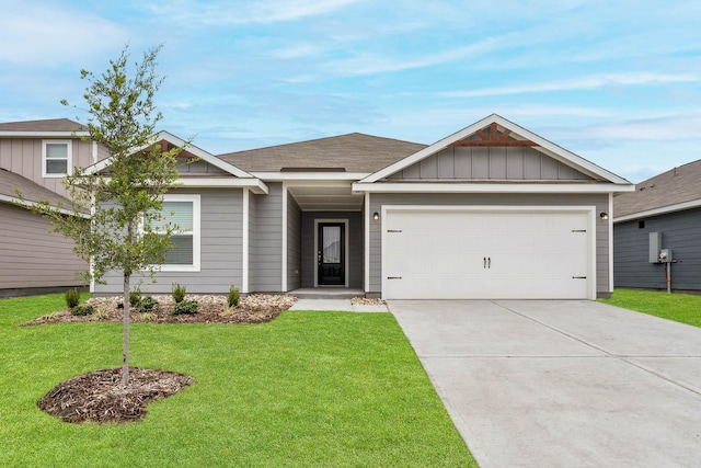 view of front facade featuring board and batten siding, an attached garage, concrete driveway, and a front lawn