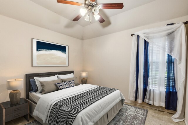 bedroom with carpet and a ceiling fan