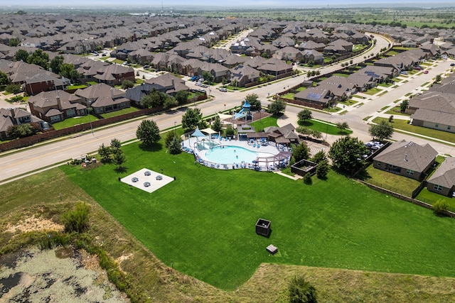 birds eye view of property with a residential view