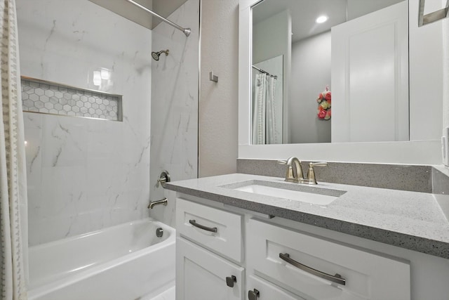full bath with vanity and shower / bath combo