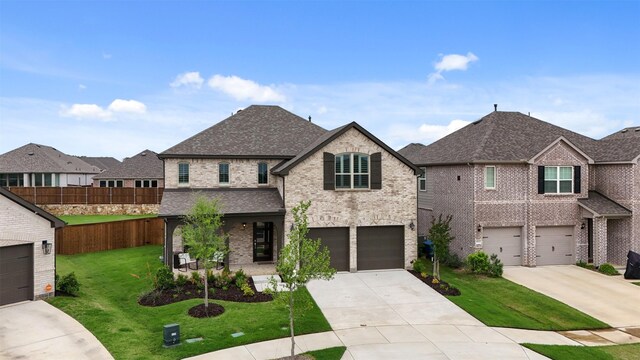 view of front of property with fence, a shingled roof, brick siding, a garage, and concrete driveway