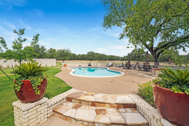 540A Southerland Ln, Weatherford, TX 76088 - view of pool with a fenced backyard, a fenced in pool, a patio, and a lawn